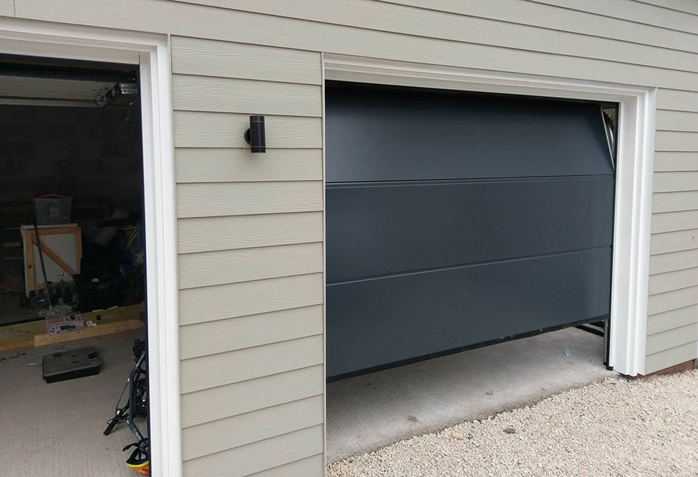 Automatic insulated sectional garage doors in Anthracite Grey